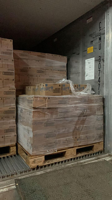 Palletised cartons loaded in a refrigerated container